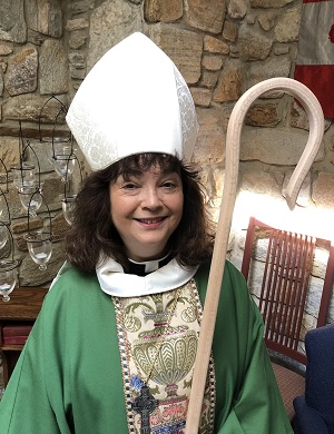 Portrait of Bishop Monica wearing miter and holding crozier