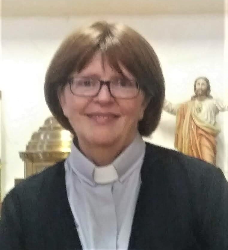 Head shot of Barb Fichter in clerical collar