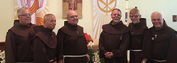 A portrait of five friars from Sts. Francis and  Clare Parish