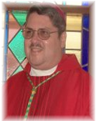 Image of Bishop Frank in red vestments and bishop cap